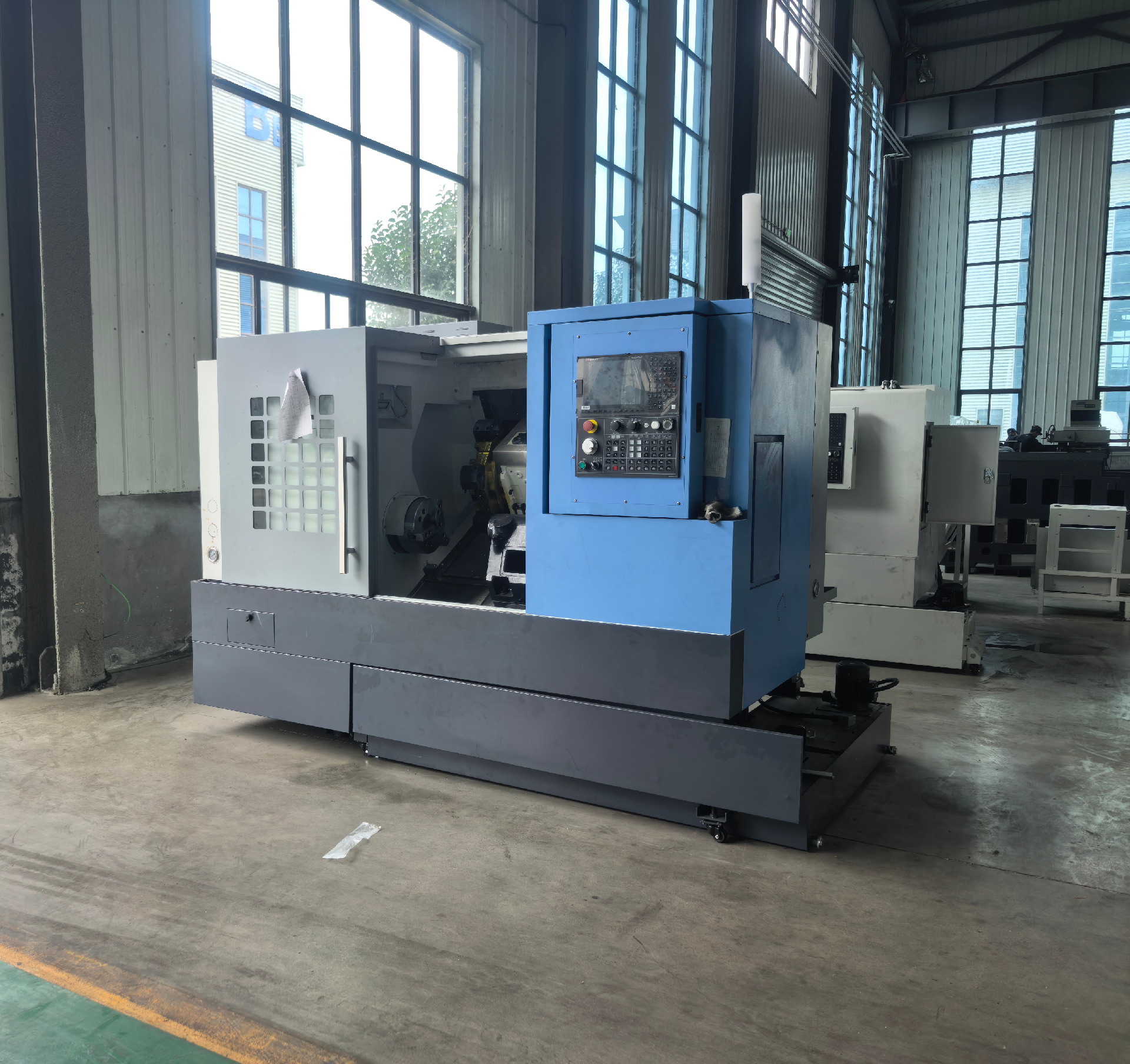 Máy tiện CNC giường nghiêng TCK6050