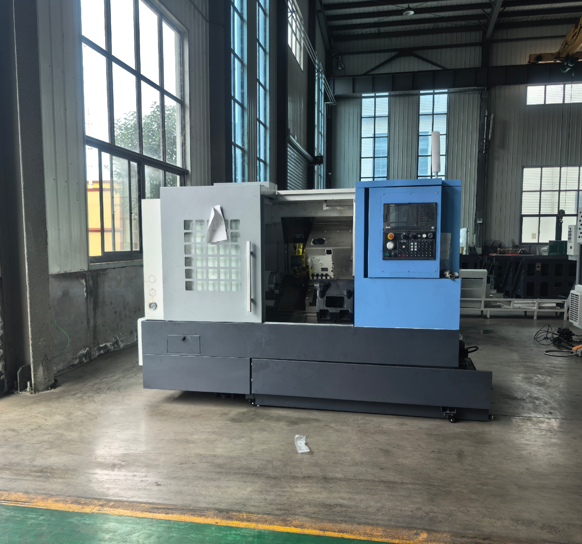 Máy tiện CNC giường nghiêng TCK6050