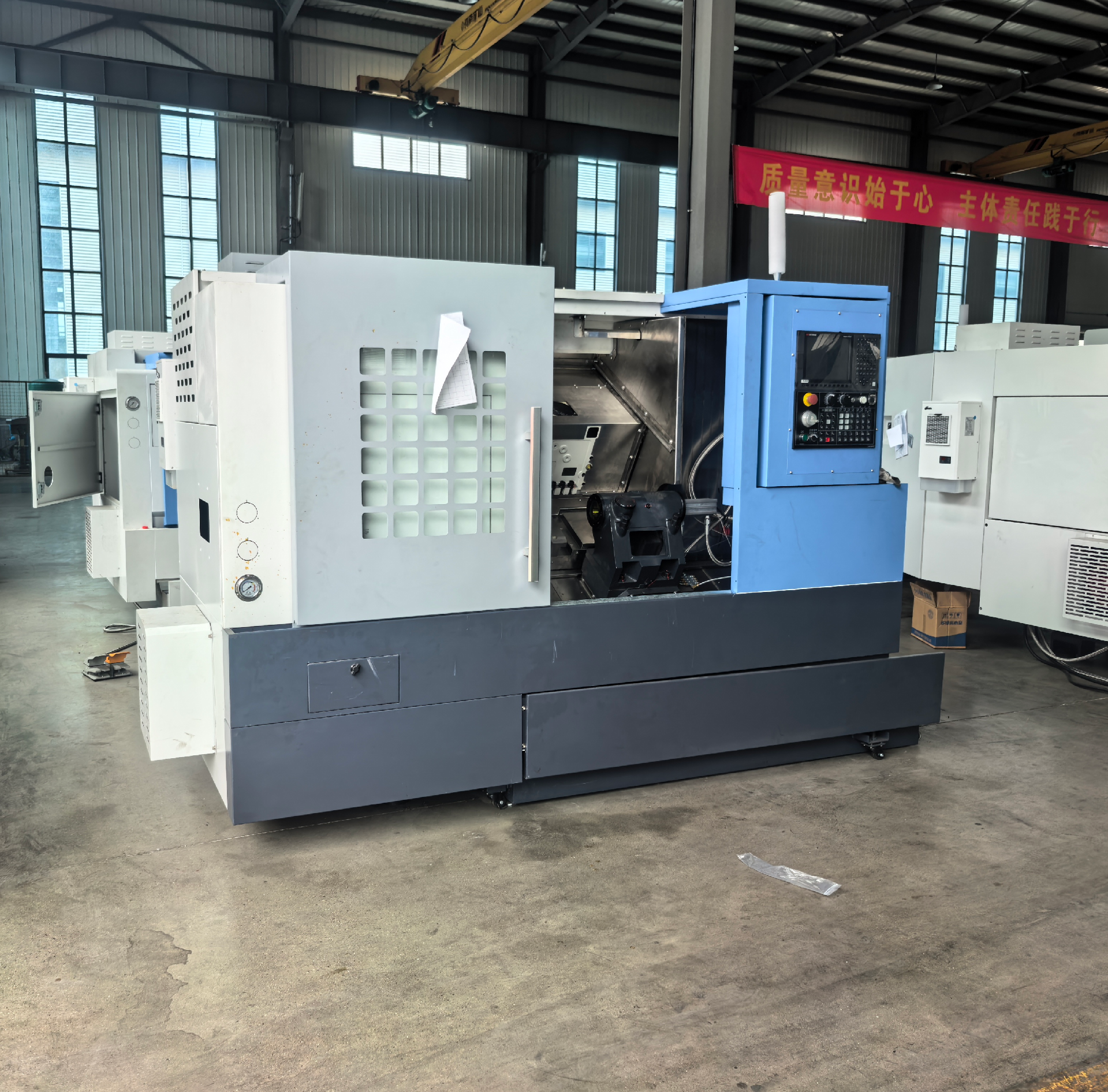 Máy tiện CNC giường nghiêng TCK6050